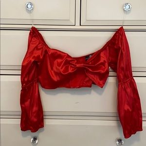 Red silk crop top.